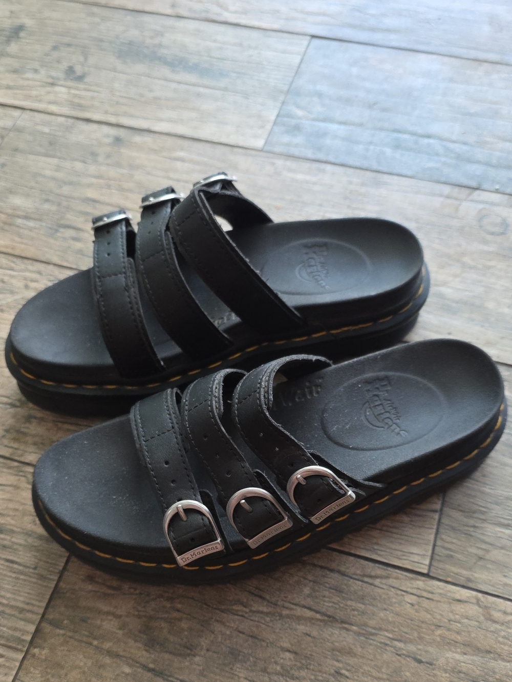 Dr. Martens Black Triple-Strap Slide Sandals with Yellow Welt Stitching